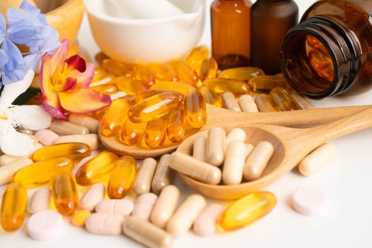 Alternative medicine herbal organic capsule with vitamin E omega 3 fish oil, mineral, drug with herbs leaf natural supplements for healthy good life.