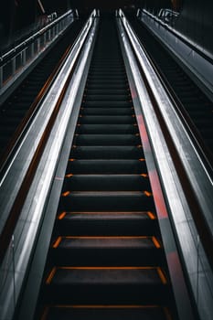 image of a black escalator. Shooting Location: Shibuya Ward, Tokyo