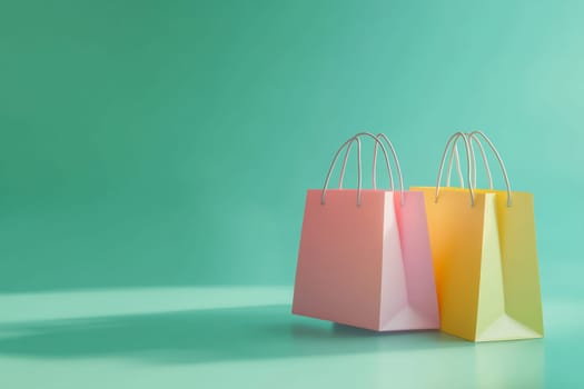 Two vibrant shopping bags in pink and yellow rest on a smooth turquoise surface under soft lighting.