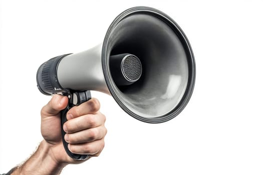 A person holds a megaphone aimed forward, ready to amplify their voice, likely for an outdoor gathering or announcement.