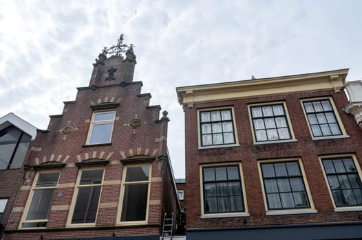 Colorful house facades with sky in the old town of Alkmaar in the Netherlands