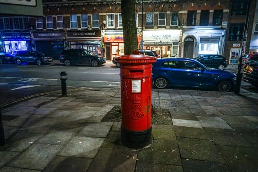 Round postal post (London City). Shooting Location: United Kingdom, London