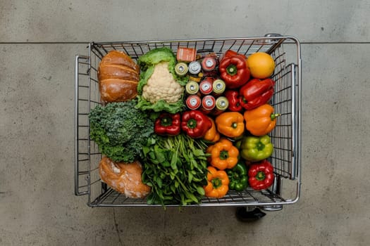 A shopping cart filled with vibrant fresh produce, including various bell peppers, leafy greens, and loaves of bread, showcases the abundance of healthy options available at a grocery store.