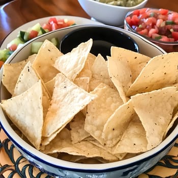 Tortilla chips party snack crunchy yellow unhealthy food meal