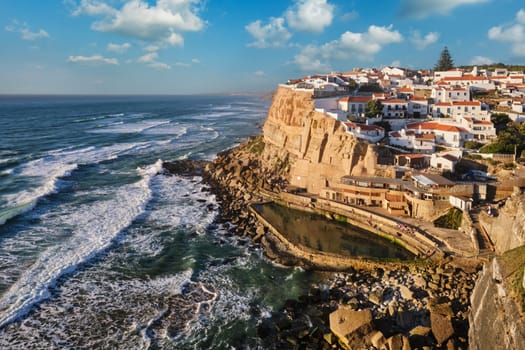 Scenic view of the seaside Azenhas do Mar fishing village on cliff on Atlantic ocean coast, Portugal