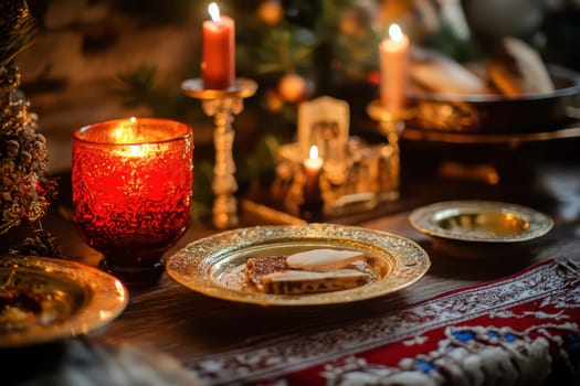 A festive table is adorned with golden plates sweet treats and glowing candles creating a cozy atmosphere for the holiday celebration.