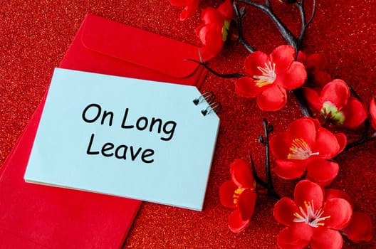 Top view of On Long Leave text with Chinese New Year decoration. Copy space and Chinese New Year celebration