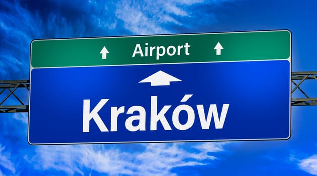 Road sign indicating direction to the city of Krakow, Poland.