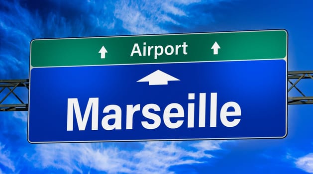 Road sign indicating direction to the city of Marseille, France.