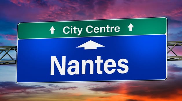 Road sign indicating direction to the city of Nantes, France.
