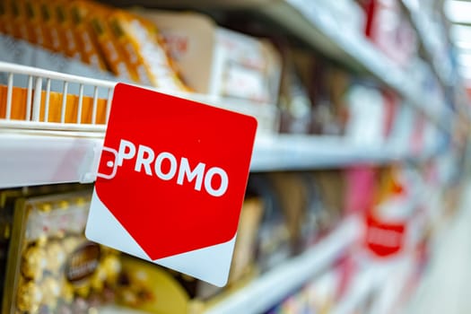 Promo sign at a shelf in a supermarket.
