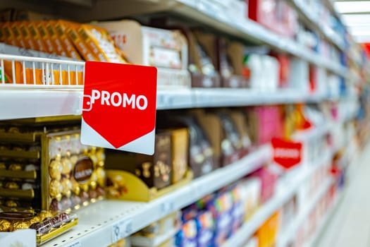 Promo sign at a shelf in a supermarket.