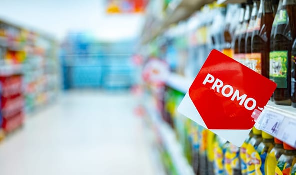 Promo sign at a shelf in a supermarket.