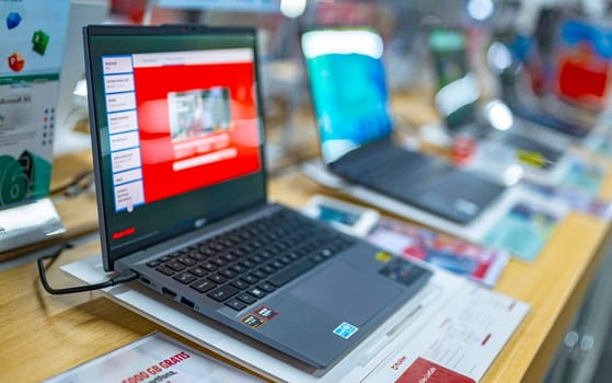 POZNAN, POL - DEC 5, 2024: Laptop computers put up for sale in a store.