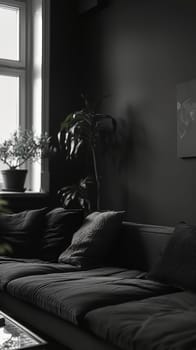 A monochrome lounge space exudes calm with plush black sofas and potted plants by a bright window. The interplay of light and shadow adds drama to the serene setting