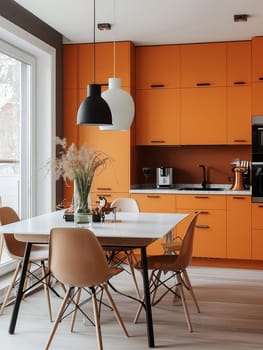 A chic kitchen with striking orange cabinets. It combines style and functionality