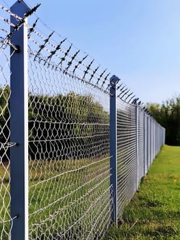 Barbed wire fence for security and protection boundary