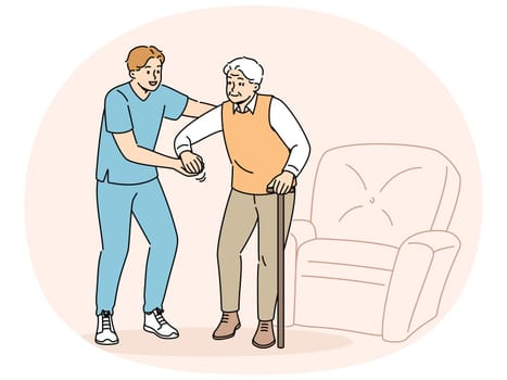 Medical worker helps sick pensioner get out of chair and walk around room or go outside. Providing assistance or support to pensioner after retirement and volunteer work in nursing home