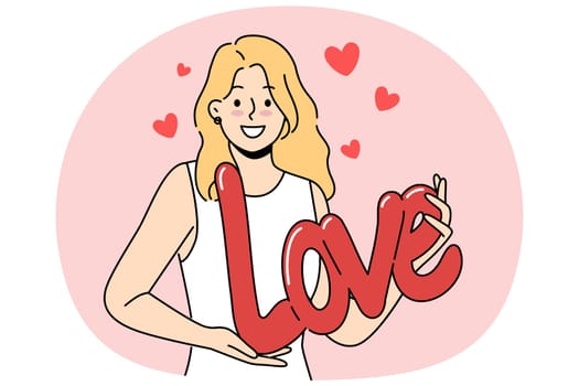 Woman demonstrates word love form of balloon, congratulating you on Valentine day or february 14th. Romantic girl confesses love to boyfriend and looks at screen smiling, offering to become couple