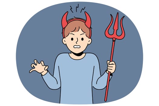 Little bully boy with devil horns makes evil grimace and terrorizes teachers at school or kindergarten. Schoolboy bully with trident angry at adults because of refusal to go for walk together