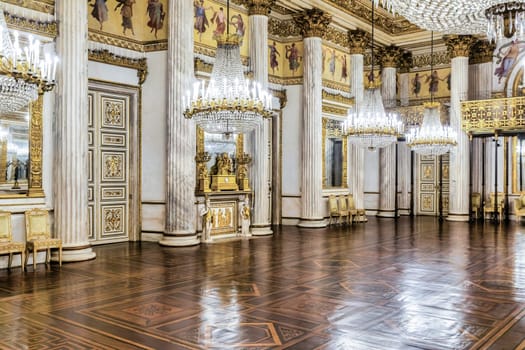 Turin, Italy - 17 november 2023: baroque ballroom interior in Royal Palace, 1842. Luxury marble, antique chandelier, classic floor