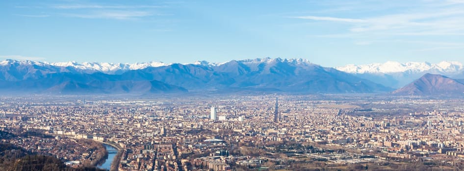Turin, Italy - 24 December 2023: panoramic view with Alps and blue sky