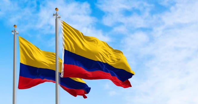 Colombia national flags waving in the wind on a clear day. Horizontal tricolor of yellow, blue, and red. Latin american country. 3d illustration render. Fluttering fabric. Selective focus