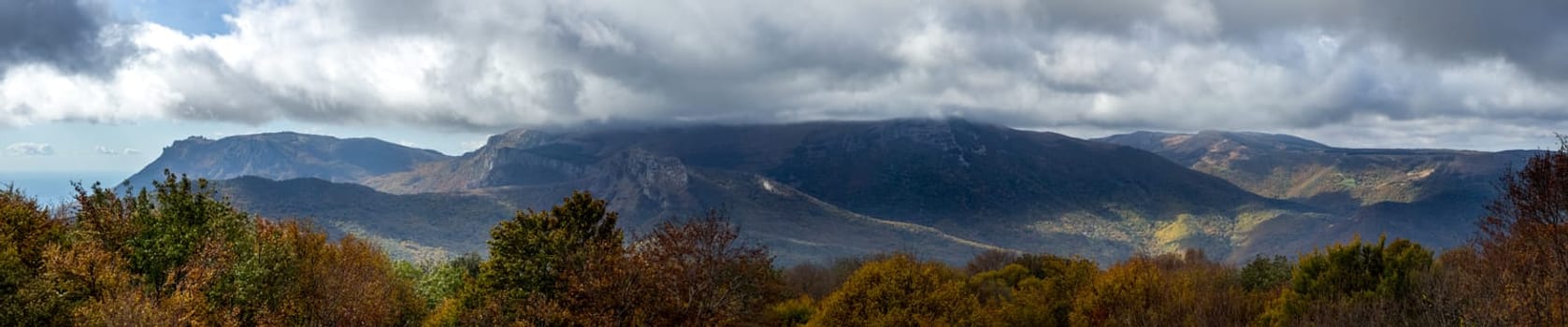 Beautiful cumulus clouds over the mountains and valleys of Crimea. The landscape of the nature of Crimea.