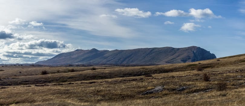 The nature of Crimea, mountains and sky. Grass and forests in the mountains.