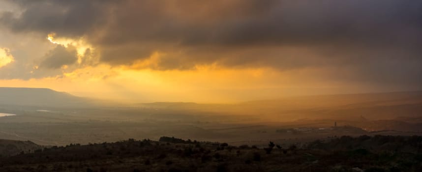 Sunset in the mountains of Crimea, Sunset landscape with rays of sun and mountains.