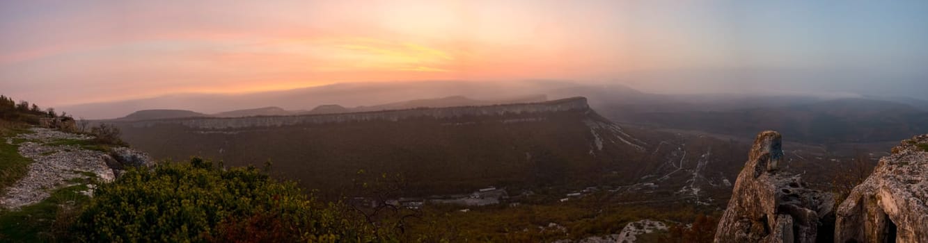 Sunset in the mountains of Crimea, Sunset landscape with rays of sun and mountains.