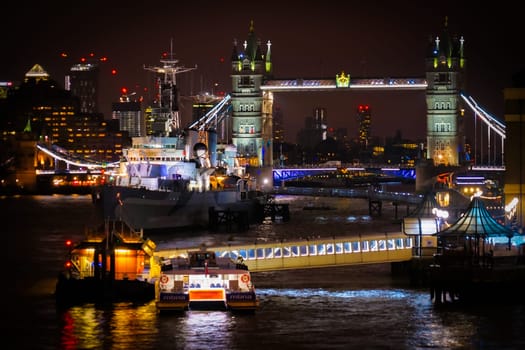 Night view of the River Thames and Tower Bridge. Shooting Location: UK, London