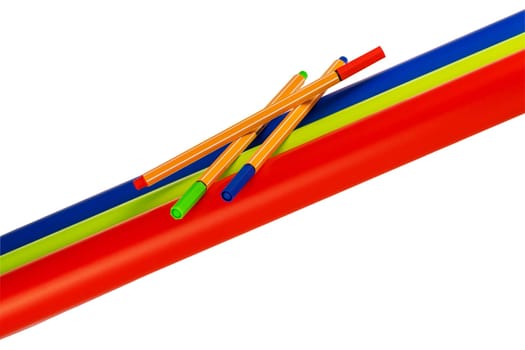 Back to school. Closeup of three colored felt or marker pens on three rolls of colored paper isolated. Clipping path. Decoration element for sales of school supplies.