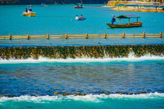 Quiet river scenery and boating. Shooting Location: Kyoto prefecture