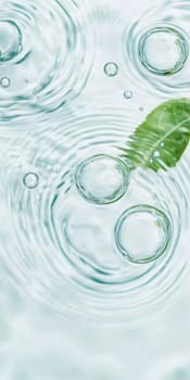 A green leaf floating on water showing ripples and bubbles, suitable as SPA background, AI generated