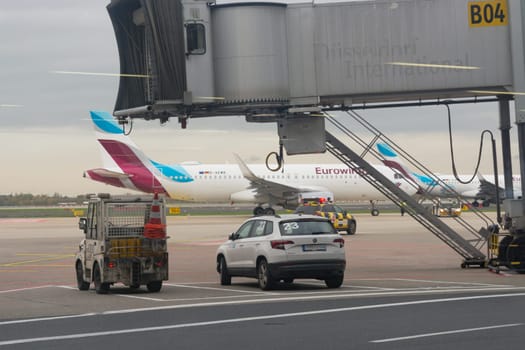 DUESSELDORF, NRW, GERMANY - NOVEMBER 11, 2019: Duesseldorf, Nrw, Germany - November 11, 2019: Dusseldorf International Airport. German passenger aircraft from Gerwing. are on the airfield.