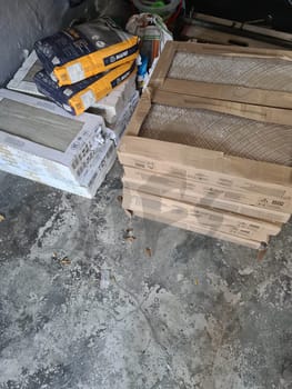 HEILIGENHAUS, NRW, GERMANY - NOVEMBER 06, 2020: Heiligenhaus, Nrw, Germany - November 06, 2020: Tiles, bricks, tools and building materials for house building