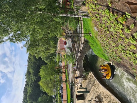 BESTWIG  NRW  GERMANY - JUNE 18  2020: Bestwig  Nrw  Germany - June 18  2020: Exciting ride on the raging river of a wild water ride