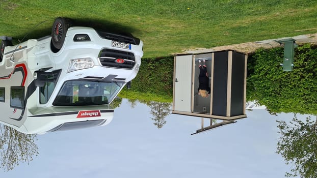 ZELADE, NETHERLANDS - MAY 05, 2022: Zelande, The Netherlands - May 05, 2022: Campers parked on a Camer Van pitch. Concept camper van leisure and fun
