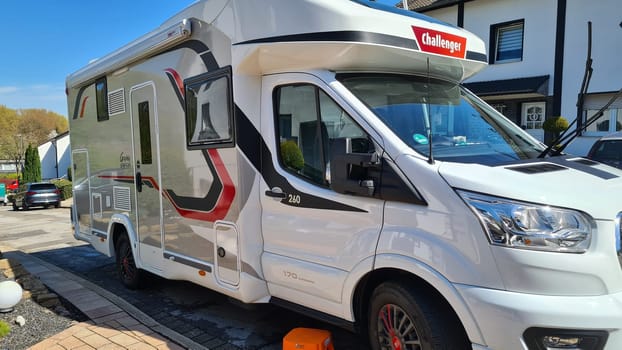 HEILIGENHAUS, NRW, GERMANY - APRIL 19, 2022: Heiligenhaus, Nrw, Germany - April 19, 2022: Motorhomes and campers for sale or rent. Concept freedom, family holiday travel, vacation travel with camper.