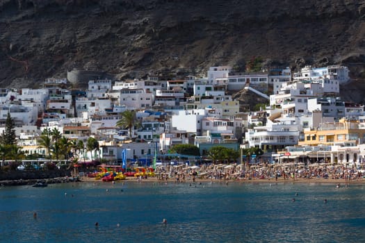 CRAN CANARIA, PUERTO DE MOGAN- NOVEMBER 15, 2019: Cran Canaria, Puerto de Mogan, Spain - November 15, 2019: Puerto de Mogan town on the coast of Gran Canaria island, Spain