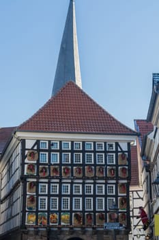 HATTINGEN OLD TOWN, NRW, GERMANY - DEZEMBER 05, 2016:  Huge Advent calendar on a half-timbered house in Hattingen. People at the Christmas market in Hattingen.