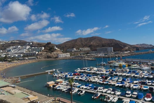 CRAN CANARIA, PUERTO RICO - NOVEMBER 16, 2019: Cran Canaria, Puerto Rico, Spain - November 16, 2019: Marina in Puerto Rico de Gran Canaria. Postcard, spain.