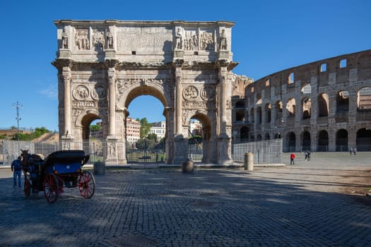 Rome, Italy - October 8, 2020: 4th century Arch of Constantine, (Arco di Costantino), it is situated between the Colosseum and Palatine Hill