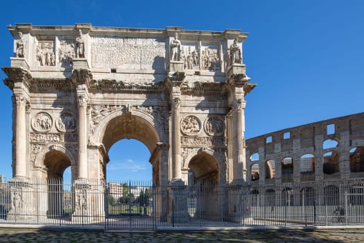 Rome, Italy - October 8, 2020: 4th century Arch of Constantine, (Arco di Costantino), it is situated between the Colosseum and Palatine Hill