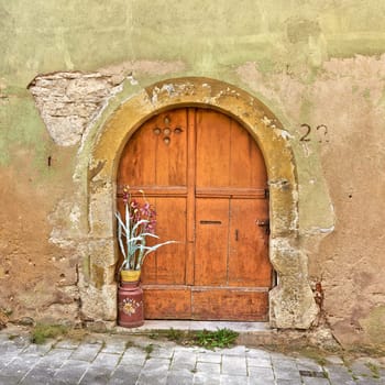 Old entrance door of a historic medieval house in the old town of Rothenburg ob der Tauber in Bavaria, Germany