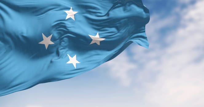 Flag of Federated states of Micronesia waving in the wind on a clear day. Independent state located in the Pacific Ocean. 3d illustration render. Selective focus
