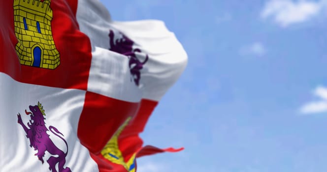 Close-up of Castile and Leon flag waving on a clear day. Autonomous community in north-western Spain. 3d illustration render. Selective focus. Rippled textile