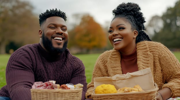 A cheerful couple shares a joyful picnic in a park, surrounded by autumn colors and delicious food.