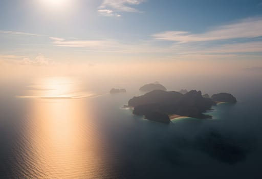 Golden rays of sunlight bathe a distant Pacific archipelago, highlighting rugged shorelines with a warm, breathtaking brilliance.